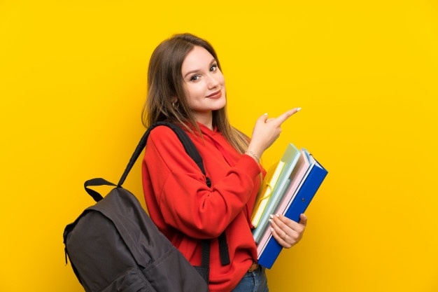  teenager student girl yellow pointing finger side 1368 40175